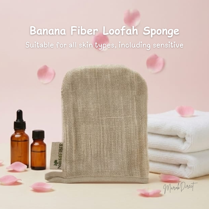Banana fiber loofah sponge with bottles and towels on a pink background
