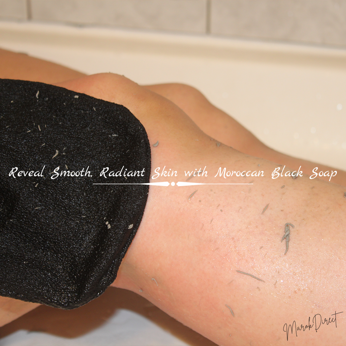 Person using Moroccan Black Soap on a leg with text overlay says reveal smooth radiant skin with moroccan black soap